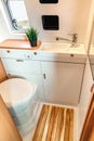 Camper van bathroom interior with toilet Royalty Free Stock Photo