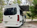 A Camper Van at a campsite near Fort White, Florida on a beautiful sunny day