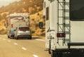 Camper Van and Diesel Pusher Motorhome on a Highway Royalty Free Stock Photo
