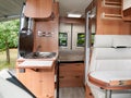 Camper van motorhome inside new modern wooden interior Royalty Free Stock Photo