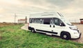 Camper van parked near to a lighthouse