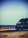 Camper van on sea cliff, camping Royalty Free Stock Photo