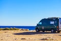 Camper van on sea cliff, camping Royalty Free Stock Photo