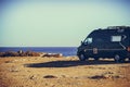 Camper van on sea cliff, camping Royalty Free Stock Photo