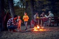 Campers with children enjoying in wood Royalty Free Stock Photo