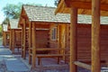 Campers like log cabin cottages to stay in for vacation time. This is a row of vintage cottages.