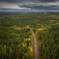 Campervan driving in landscape of Wildernes Road in Lapland in Sweden from above Royalty Free Stock Photo