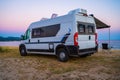 Campervan or motorhome parked on the beach in Greece