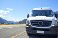 Campervan parked in a laybay on a remote road Royalty Free Stock Photo