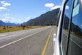 Campervan parked in a laybay on a remote road Royalty Free Stock Photo