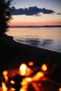 A campfire near a lake Royalty Free Stock Photo