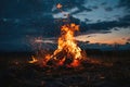 Campfire at night. Flames of fire against cloudy sky at sunset. Bonfire in the country. AI Generated Royalty Free Stock Photo