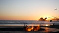 Campfire pit in California USA. Camp fire on ocean sea beach, roasting toast marshmallow on bonfire. Royalty Free Stock Photo