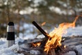 Campfire in the snow. Picnic in winter. Outdoor activity