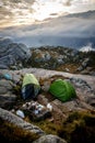 Campground in the mountains. Morning fog around Royalty Free Stock Photo