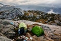 Campground in the mountains. Morning fog around Royalty Free Stock Photo