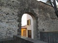 Campi Bisenzio, Italy, Medieval door, arched entrance, Porta Santo Stefano, old town walls. Royalty Free Stock Photo