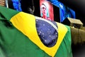 The flag of Brazil and President Bolsonaro online on stage at CPAC Brasil