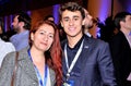 DÃÂ©bora Mota with young councilor Nikolas Ferreira at CPAC Brazil