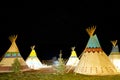 Camping at American First Nation Teepee at Night under Stars. Royalty Free Stock Photo