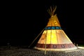 Camping at American First Nation Traditional Teepee at Night. Royalty Free Stock Photo