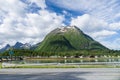 Camping area near river, mountain and road Royalty Free Stock Photo