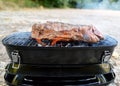 Camping barbecue with a prime rib