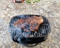 Camping barbecue with a prime rib