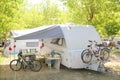 Camping camper caravan trees park bicycles