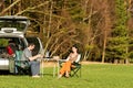 Camping car young couple enjoy picnic countryside Royalty Free Stock Photo