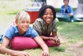 Camping, children and relaxing in portrait on outdoor adventure, bonding and happy outside. Kids, face and smiling Royalty Free Stock Photo