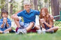 Camping, children and vacation in portrait while outside, bonding and happy for outdoor adventure. Kids, face and eating Royalty Free Stock Photo