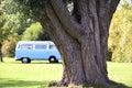 Camping in a classic style mobile home or rv at a campsite Royalty Free Stock Photo