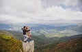 Camping couple in love. Couples of lovers tourists relax on nature. Camping trip with lovers. Royalty Free Stock Photo