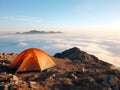 Camping with friends near lake and mountain, camping tent setup near river or mountain on afternoon or morning, hiking and camping Royalty Free Stock Photo