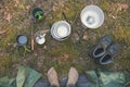 camping gear and traveler feet by the tent