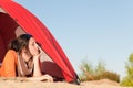 Camping happy woman relax tent on beach Royalty Free Stock Photo