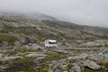 Camping holidays car on the mountain road, summer in norway Royalty Free Stock Photo