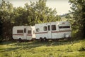 Camping life with caravans in nature park Royalty Free Stock Photo