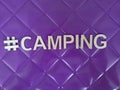 #camping camping message on a purple background Royalty Free Stock Photo