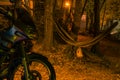 Camping. Motorcycle and hammock. Parking in the woods. Travel and vacation. Equipment for tourism. Marmore italy