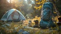 Camping in the mountains, tent, backpack and water bottle. Oneness with nature Royalty Free Stock Photo