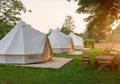 Camping picnic tent campground in outdoor hiking forest. Camper while campsite in nature background at summer trip camp. Adventure