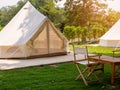 Camping picnic tent campground in outdoor hiking forest. Camper while campsite in nature background at summer trip camp. Adventure