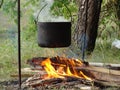 Camping pot and campfire Royalty Free Stock Photo
