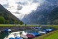 Camping on the shore of the lake. Boats on the dock. Switzerlan Royalty Free Stock Photo