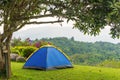 Camping tent in campground at national park with sunrise Royalty Free Stock Photo