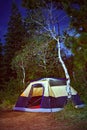 Camping tent in the forest at night Royalty Free Stock Photo