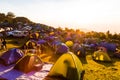 Camping tent on grass while sun rise