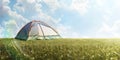 Camping tent in grass. Tourism. Adventure. Hike. Background. Panorama